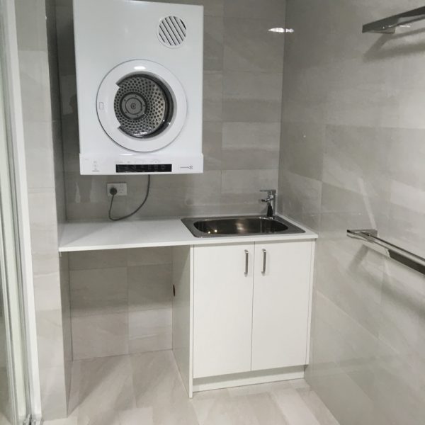 Laundry room renovation designed and installed by Brisbane kitchen builder Gecko Kitchens is a licenced QBCC member.