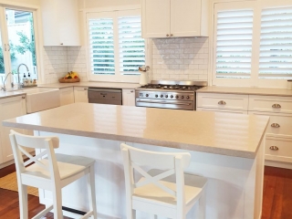 Beautiful white kitchen with Ceaserstone Clambshell Benchtop Beautiful white kitchen with Ceaserstone Clambshell Benchtop designed and built by Gecko Kitchens Brisbane