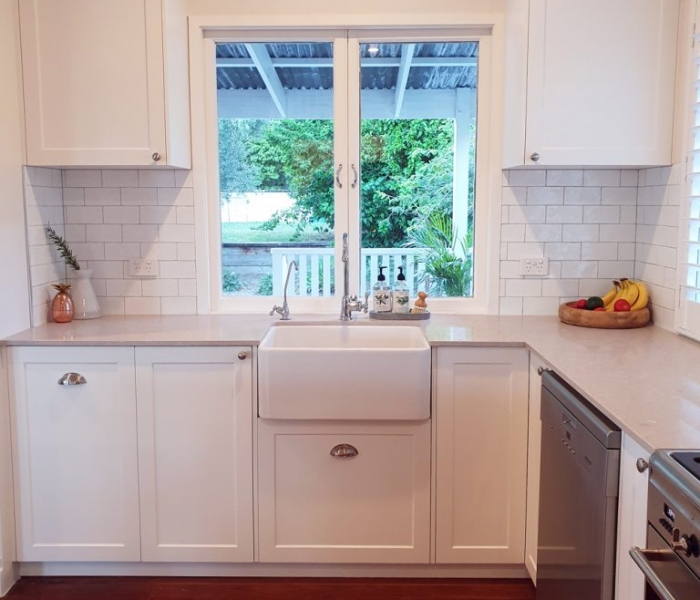 Beautiful white kitchen with Ceaserstone Clambshell Benchtop designed and built by Gecko Kitchens Brisbane