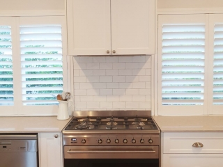 Beautiful white kitchen with Ceaserstone Clambshell Benchtop Beautiful white kitchen with Ceaserstone Clambshell Benchtop designed and built by Gecko Kitchens Brisbane