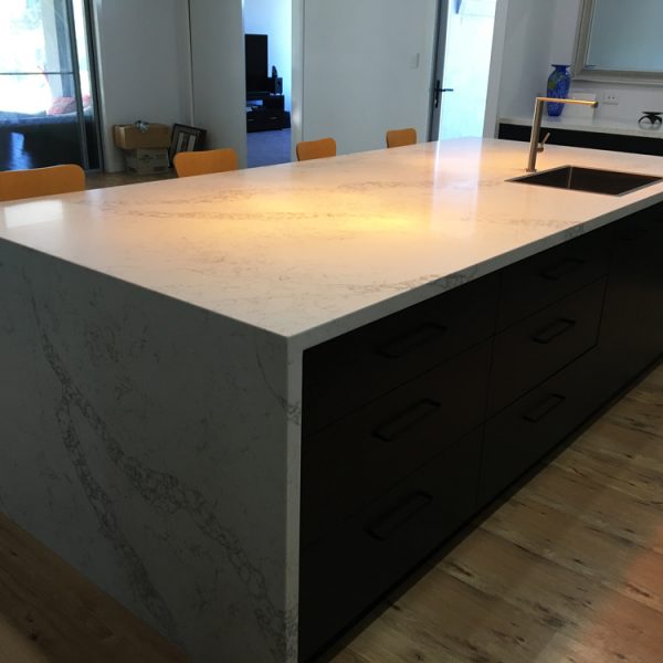 Kitchen bench with stone benchtop built by Gecko Kitchens a licenced builder of kitchens, bathrooms and laundries.