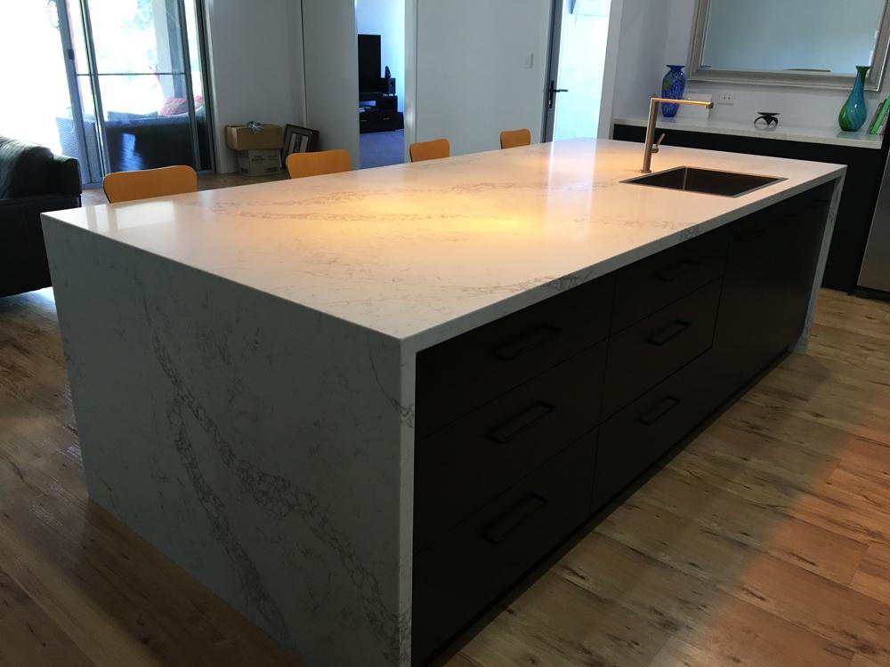 Kitchen bench with stone benchtop built by Gecko Kitchens a licenced builder of kitchens, bathrooms and laundries.