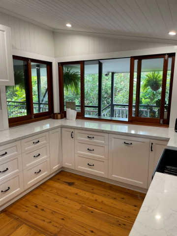 White Kitchen with Black appliances designed and built by Gecko Kitchens Brisbane.