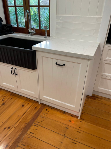 White Kitchen with Black appliances designed and built by Gecko Kitchens Brisbane.