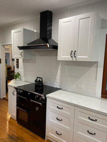 White Kitchen with Black appliances designed and built by Gecko Kitchens Brisbane.