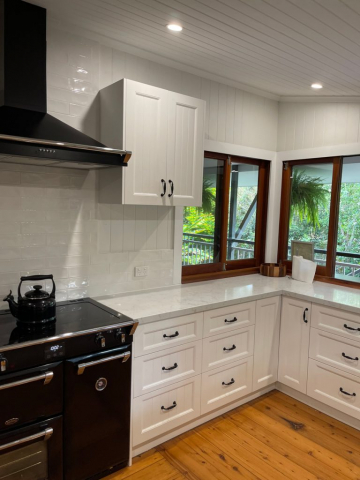 White Kitchen with Black appliances designed and built by Gecko Kitchens Brisbane.