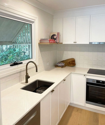 White kitchen cabinetry installed with Supreme Qubix 100 sink by Gecko Kitchens, Upper Kedron White kitchen cabinetry installed with Supreme Qubix 100 sink by Gecko Kitchens, Upper Kedron