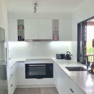 U Shaped White kitchen renovation with white cabinetry and handles by Barchie installed by Gecko Kitchens, Upper Kedron, Brisbane.
