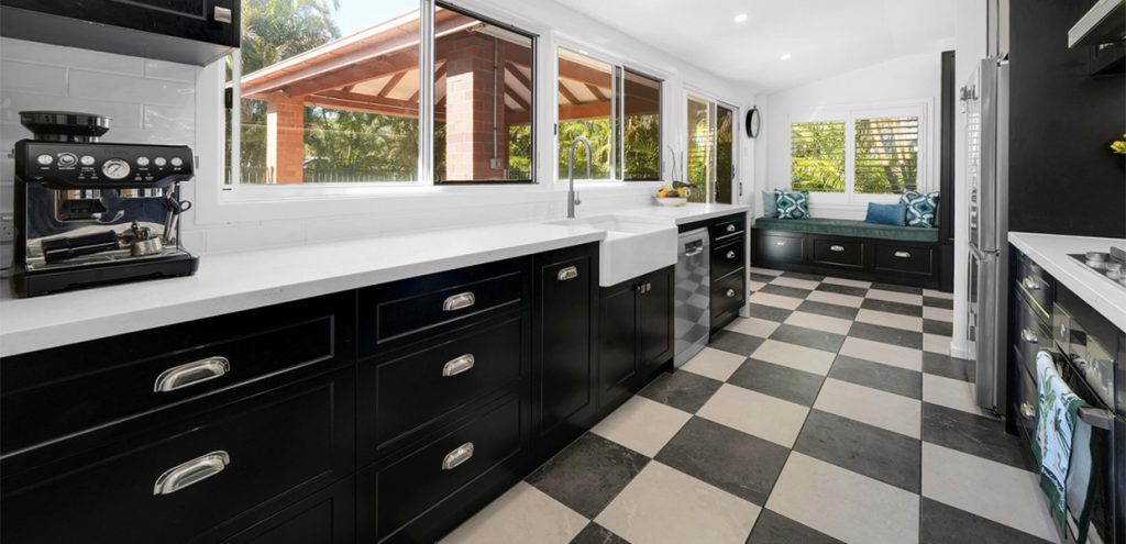 Beautiful kitchen installation featuring Polytec Thermolaminated Matt Black doors in the sophisticated Casino by Gecko Kitchens in Brighton.