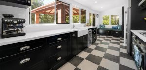 Beautiful kitchen installation featuring Polytec Thermolaminated Matt Black doors in the sophisticated Casino by Gecko Kitchens in Brighton.
