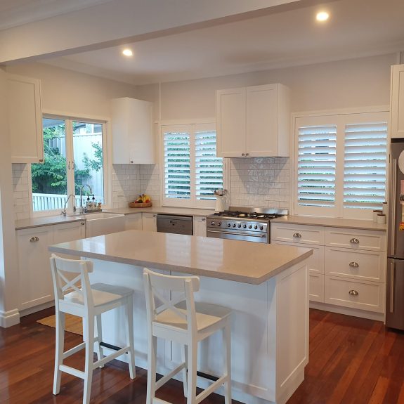 White kitchen designed and installed by expert kitchen builder Gecko Kitchens in Brisbane.