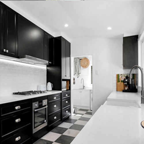Black and white kitchen featuring Polytec Thermolaminated Matt Black Doors Black and white kitchen featuring Polytec Thermolaminated Matt Black doors in the elegant Casino profile,