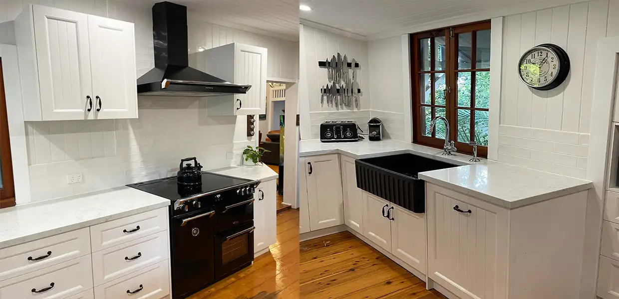 Traditional white kitchen with double farmhouse sink,  and black appliances by Gecko Kitchens, Kedron Brisbane. 