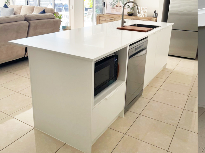 Polytec Classic White Matt cabinetry complemented by Soft Walnut timber doors, with YDL Stone benchtops.